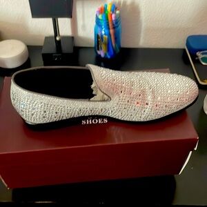Shiny silver prom shoes